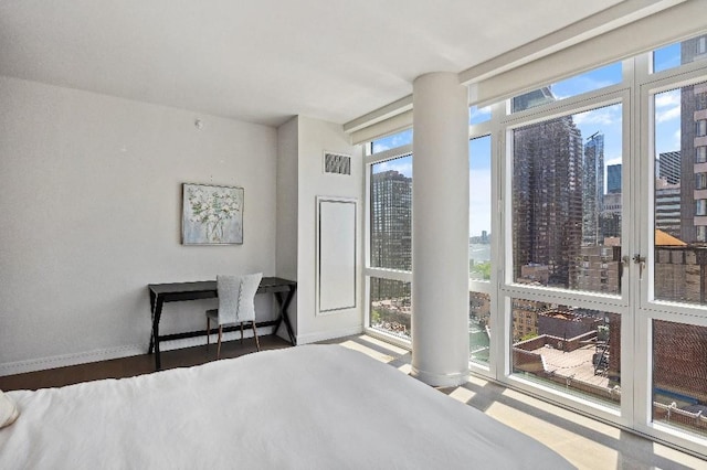 305 E 51st St Unit 20-B, New York City, NY 10022 - bedroom with a view of skyline