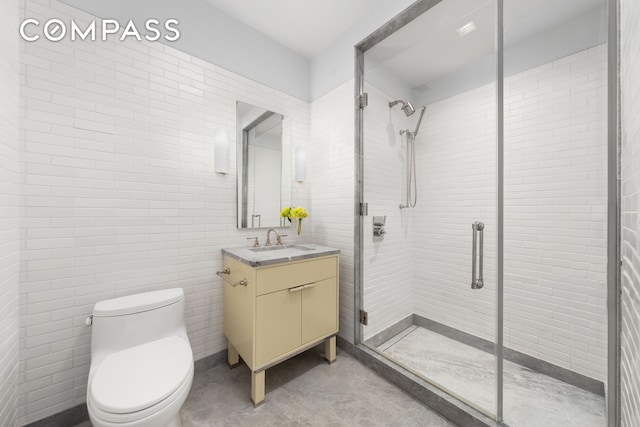 150 Charles St Unit 4An, New York City, NY 10014 - full bath with vanity, a shower stall, toilet, concrete floors, and tile walls