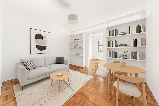 300 E 40th St Unit 24P, New York City, NY 10016 - living area featuring baseboards