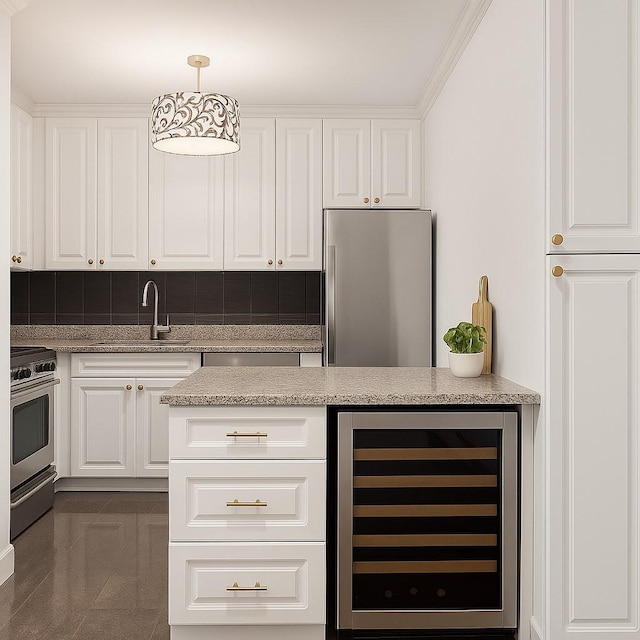300 E 40th St Unit 24P, New York City, NY 10016 - kitchen featuring wine cooler, stainless steel appliances, white cabinets, backsplash, and light stone counters