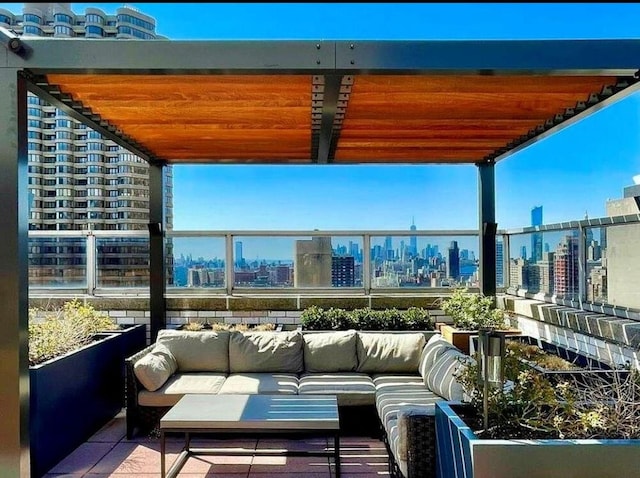 300 E 40th St Unit 24P, New York City, NY 10016 - balcony featuring an outdoor hangout area and a view of skyline