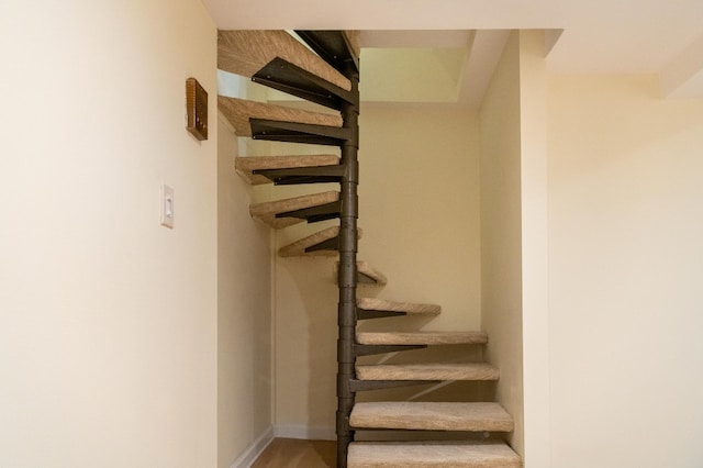 344 E 58th St Unit A, New York City, NY 10022 - stairs featuring wood finished floors