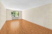 250 W 24th St Unit 1Cw, New York City, NY 10011 - empty room with radiator heating unit and baseboards
