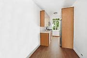 250 W 24th St Unit 1Cw, New York City, NY 10011 - corridor featuring baseboards