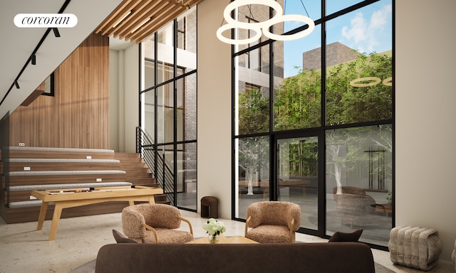 625 New York Ave Unit 3A, New York City, NY 11203 - building lobby with floor to ceiling windows, a towering ceiling, and stairway