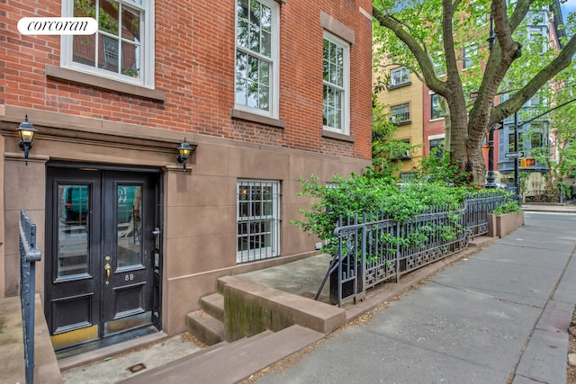 89 State St Unit 1, New York City, NY 11201 - view of exterior entry featuring french doors and brick siding