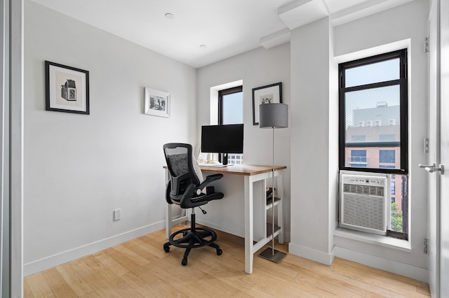 10-55 47th Ave Unit 7-F, New York City, NY 11101 - office area featuring light wood finished floors and heating unit