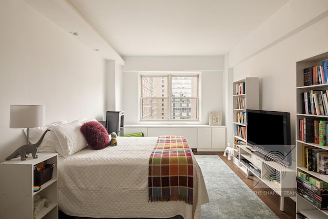 165 W 66th St Unit 21Ef, New York City, NY 10023 - bedroom featuring wood finished floors