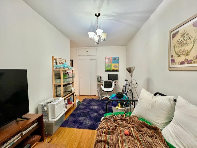 298 12th St Unit 2F, New York City, NY 11215 - living area with a chandelier and wood finished floors