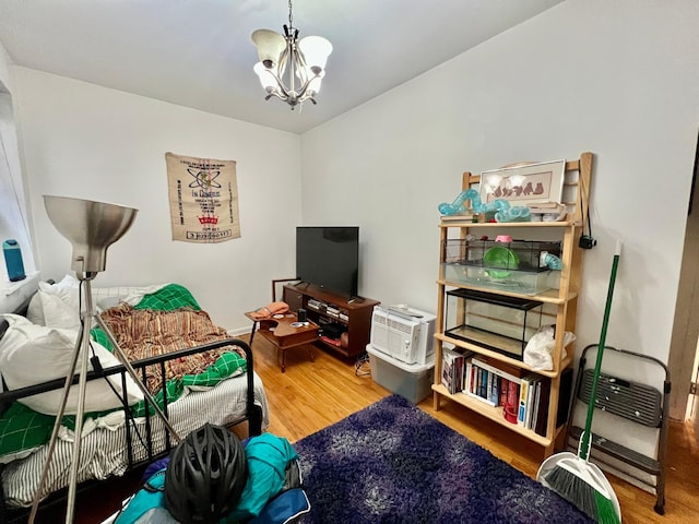 298 12th St Unit 2F, New York City, NY 11215 - sitting room with wood finished floors and a chandelier