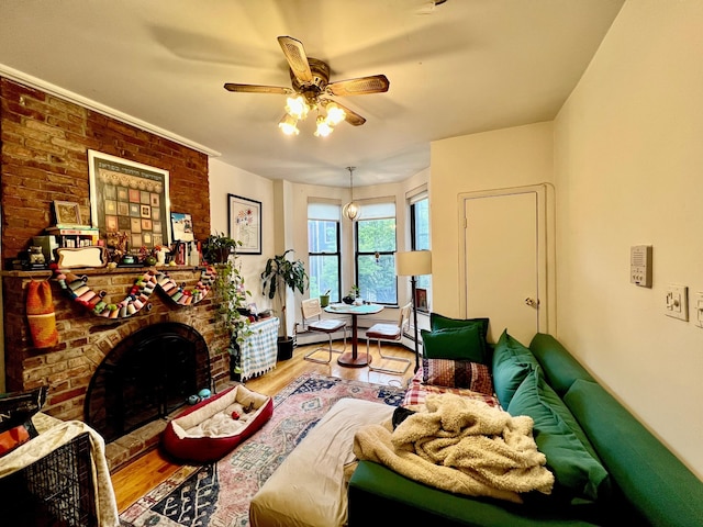298 12th St Unit 2F, New York City, NY 11215 - living area featuring wood finished floors, ceiling fan, and a brick fireplace
