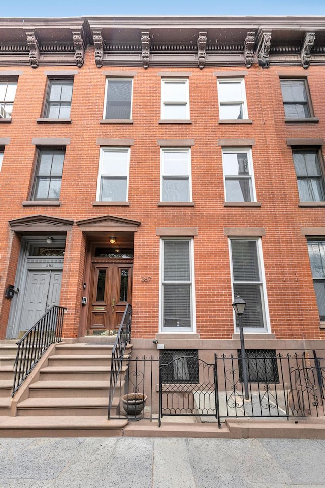 367 Carlton Ave, New York City, NY 11238 - view of property featuring a fenced front yard