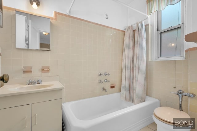 3321 Bruckner Blvd Unit 2D, New York City, NY 10461 - bathroom with tile walls, vanity, shower / bathtub combination with curtain, toilet, and tasteful backsplash