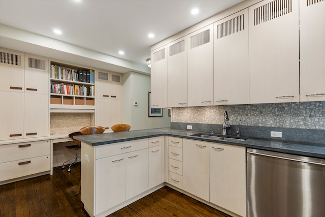14 E 75th St Unit 10D, New York City, NY 10021 - kitchen with stainless steel dishwasher, a sink, a peninsula, open shelves, and dark countertops