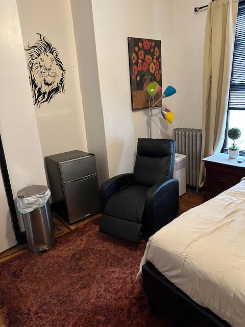 1181 Bushwick Ave, New York City, NY 11221 - bedroom featuring radiator heating unit