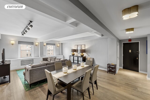 2166 Broadway Unit 7B, New York City, NY 10024 - dining space with light wood finished floors and rail lighting
