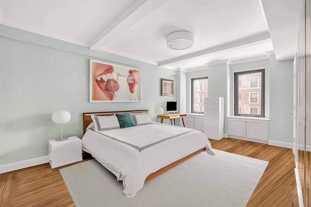 400 W End Ave Unit 6B, New York City, NY 10024 - bedroom with beamed ceiling, baseboards, and wood finished floors