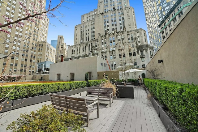 55 Wall St Unit 816, New York City, NY 10005 - view of property's community featuring outdoor lounge area and a view of city