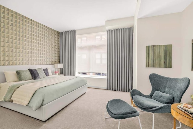 21 W 20th St Unit Ph1, New York City, NY 10011 - carpeted bedroom with an accent wall and wallpapered walls