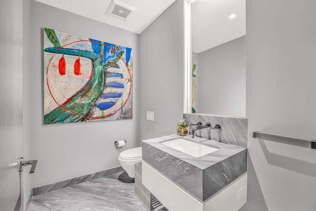 21 W 20th St Unit Ph1, New York City, NY 10011 - half bath featuring vanity and marble finish floors