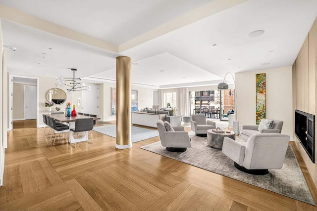 21 W 20th St Unit Ph1, New York City, NY 10011 - living area featuring a chandelier and a fireplace