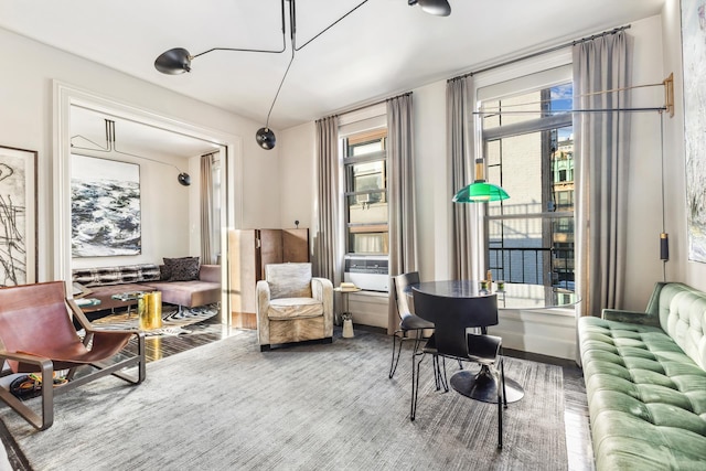 105 E 15th St Unit 106, New York City, NY 10003 - sitting room with wood finished floors and cooling unit