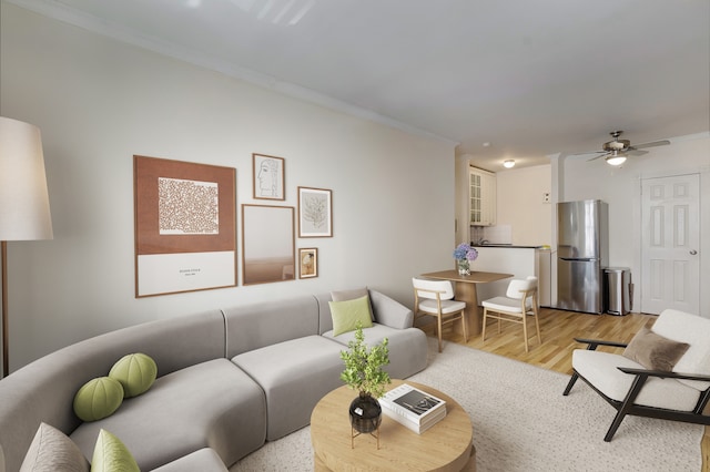229 E 29th St Unit E-3, New York City, NY 10016 - living room featuring ornamental molding, light wood-type flooring, and ceiling fan