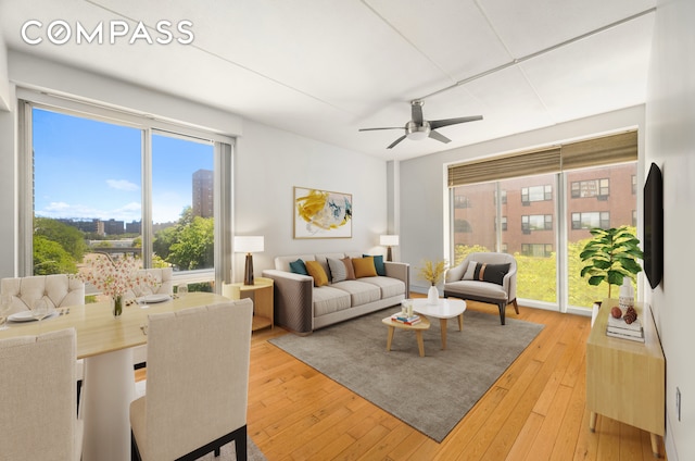 29 W 138th St Unit 5A, New York City, NY 10037 - living area featuring ceiling fan and light wood-style flooring
