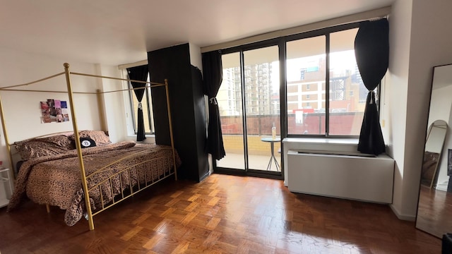 311 E 38th St Unit 12C, New York City, NY 10016 - bedroom featuring access to exterior and radiator