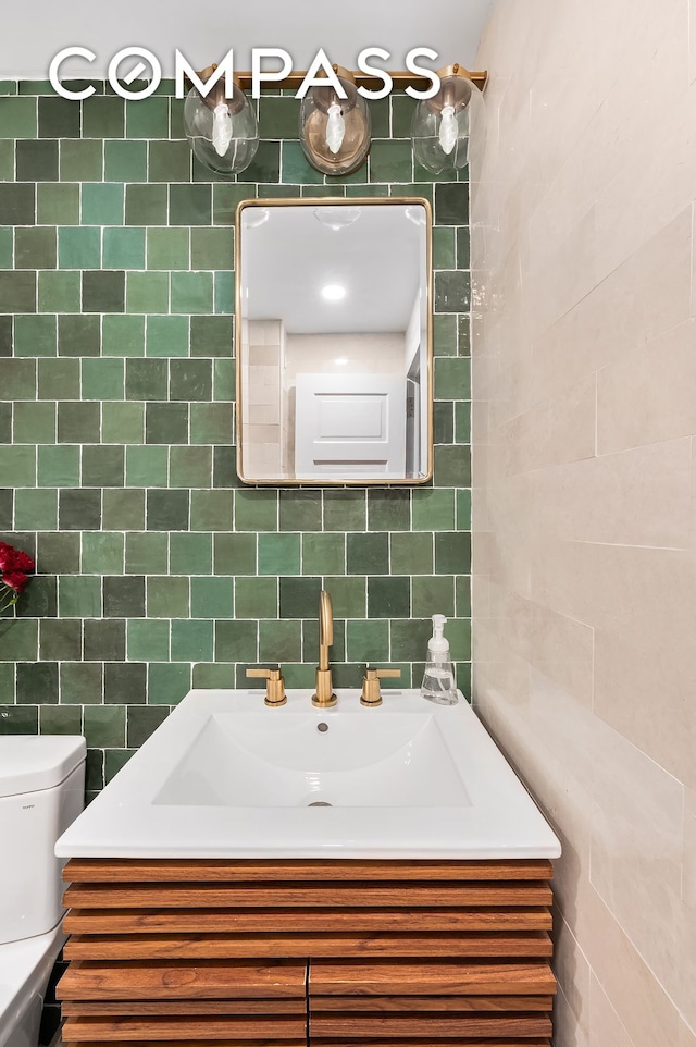334 E 5th St Unit 2, New York City, NY 10003 - half bath with tile walls and vanity