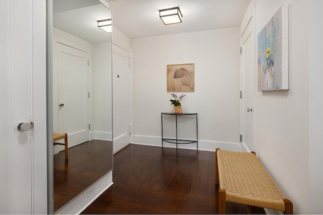 59 W 12th St Unit 4A, New York City, NY 10011 - hall featuring dark wood-type flooring and baseboards