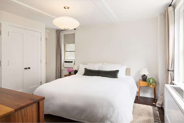 59 W 12th St Unit 4A, New York City, NY 10011 - bedroom featuring a closet, dark wood-type flooring, and cooling unit