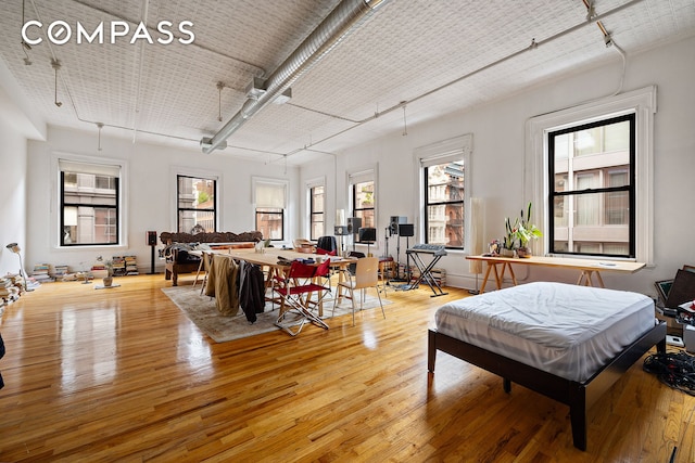 391/2 Crosby St Unit 4, New York City, NY 10012 - dining room featuring light wood finished floors
