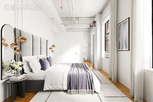 391/2 Crosby St Unit 4, New York City, NY 10012 - bedroom with multiple windows and light wood-style flooring