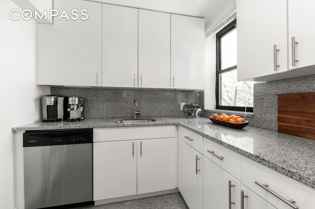 22-40 80th St Unit 3B, New York City, NY 11370 - kitchen with dishwasher, a sink, white cabinetry, tasteful backsplash, and light stone counters