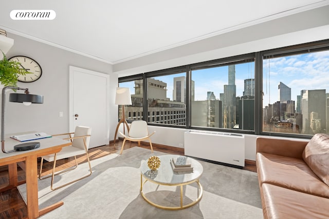 150 W 56th St Unit 3502, New York City, NY 10019 - living area with crown molding, a skyline view, a desk, and radiator heating unit