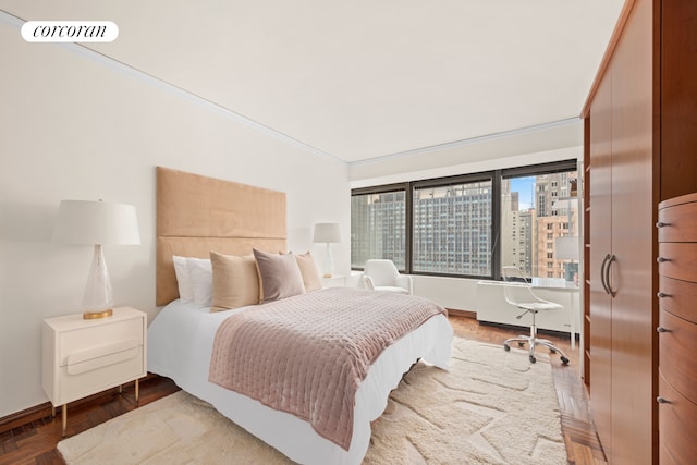 150 W 56th St Unit 3502, New York City, NY 10019 - bedroom with a desk and ornamental molding