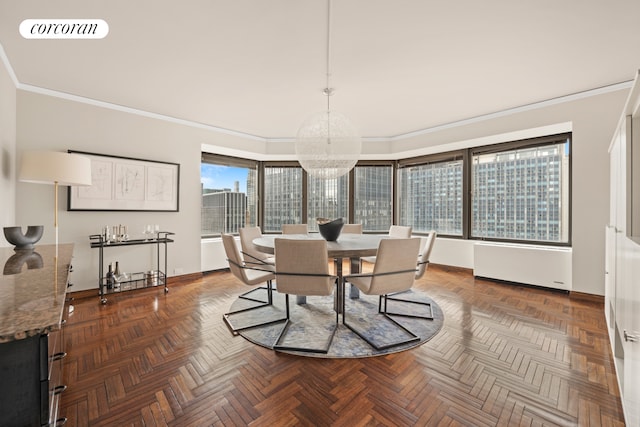 150 W 56th St Unit 3502, New York City, NY 10019 - dining space featuring a chandelier, radiator heating unit, baseboards, and ornamental molding