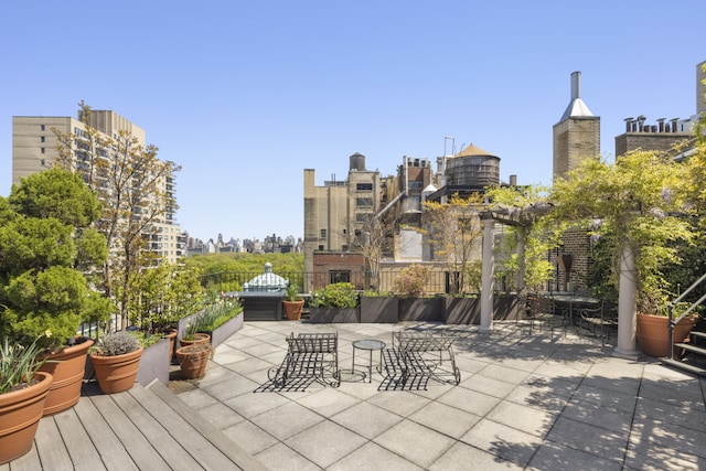 27 W 67th St Unit 2Fe, New York City, NY 10023 - view of patio / terrace with a skyline view and outdoor dining area