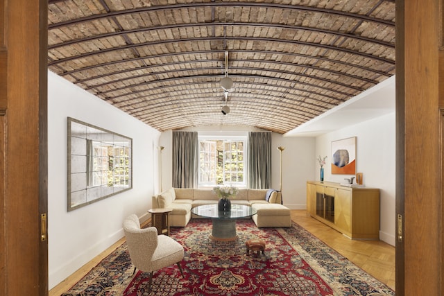 27 W 67th St Unit 2Fe, New York City, NY 10023 - living area featuring baseboards and lofted ceiling