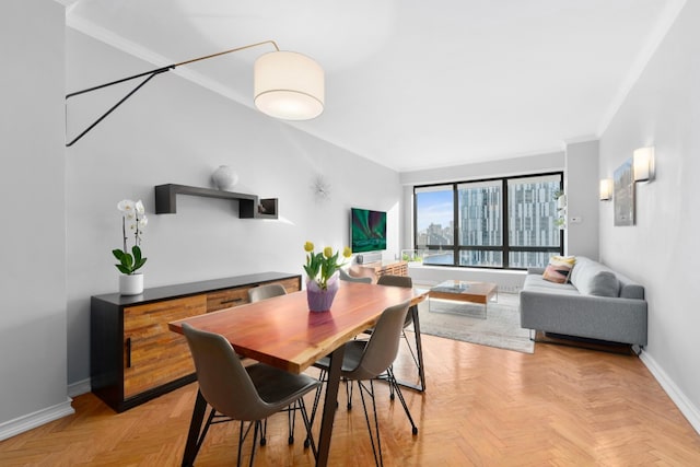 530 E 76th St Unit 20B, New York City, NY 10021 - dining area with baseboards and crown molding