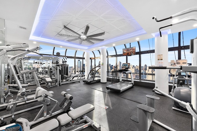 530 E 76th St Unit 20B, New York City, NY 10021 - workout area with a raised ceiling, floor to ceiling windows, and a ceiling fan