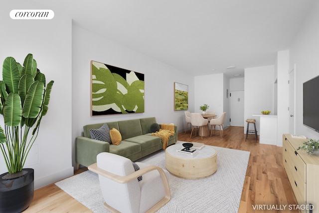 330 E 49th St Unit 1A, New York City, NY 10017 - living room with light wood-style floors