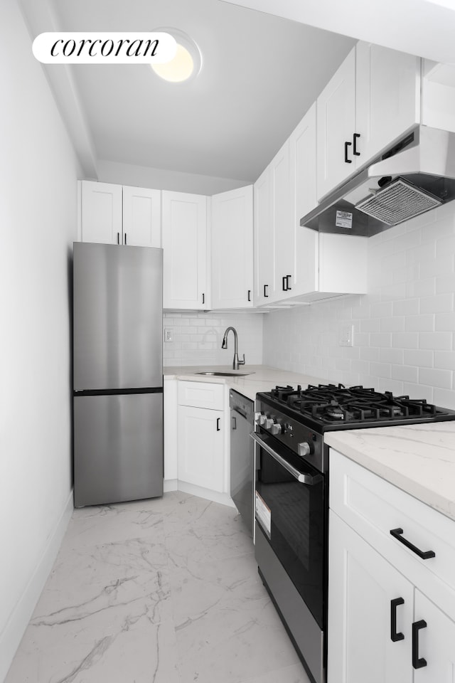 330 E 49th St Unit 1A, New York City, NY 10017 - kitchen with stainless steel appliances, under cabinet range hood, a sink, backsplash, and white cabinets