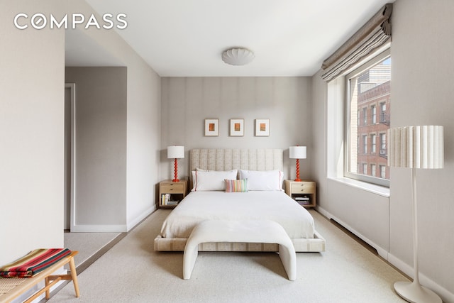116 University Pl Unit 5, New York City, NY 10003 - bedroom with multiple windows, carpet, and baseboards
