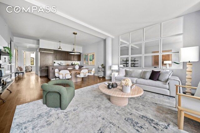 225 5th Ave Unit 7K, New York City, NY 10010 - living room with dark wood-style floors