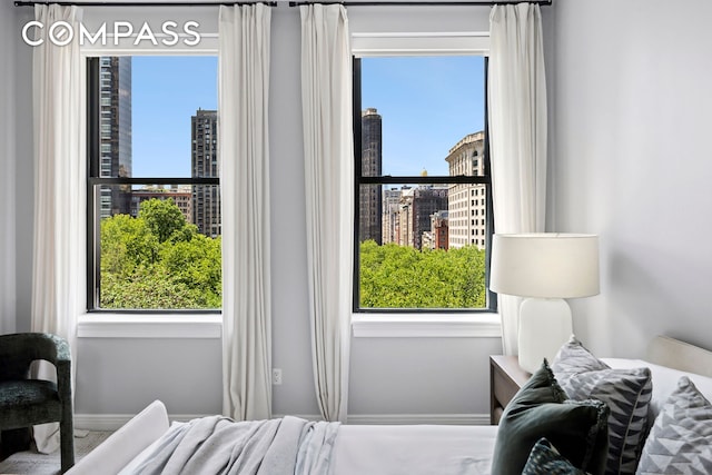 225 5th Ave Unit 7K, New York City, NY 10010 - bedroom with a view of city and baseboards
