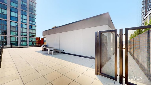 202 Broome St Unit 9M, New York City, NY 10013 - view of patio / terrace featuring a gate