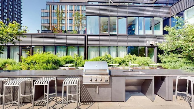202 Broome St Unit 9M, New York City, NY 10013 - view of patio with exterior kitchen and exterior bar