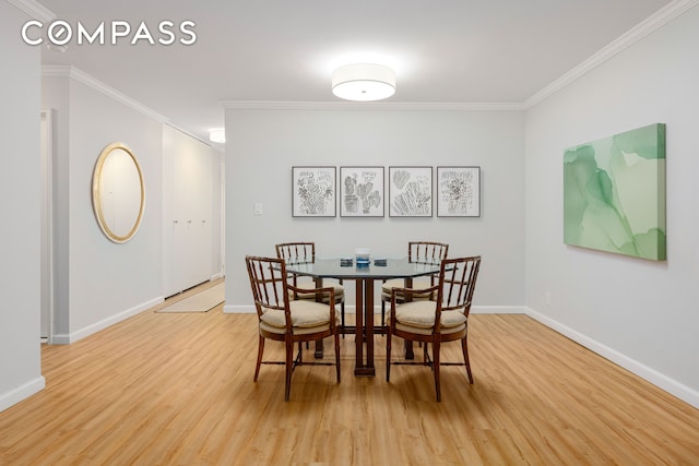 444 E 86th St Unit 11H, New York City, NY 10028 - dining area featuring light wood-style flooring and ornamental molding